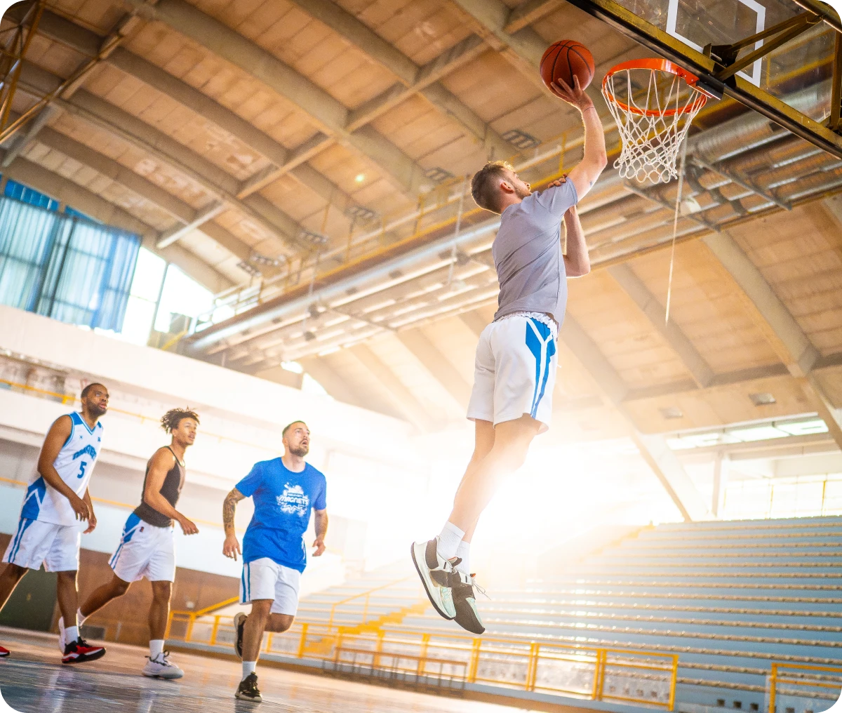 Basketball player making a slam dunk