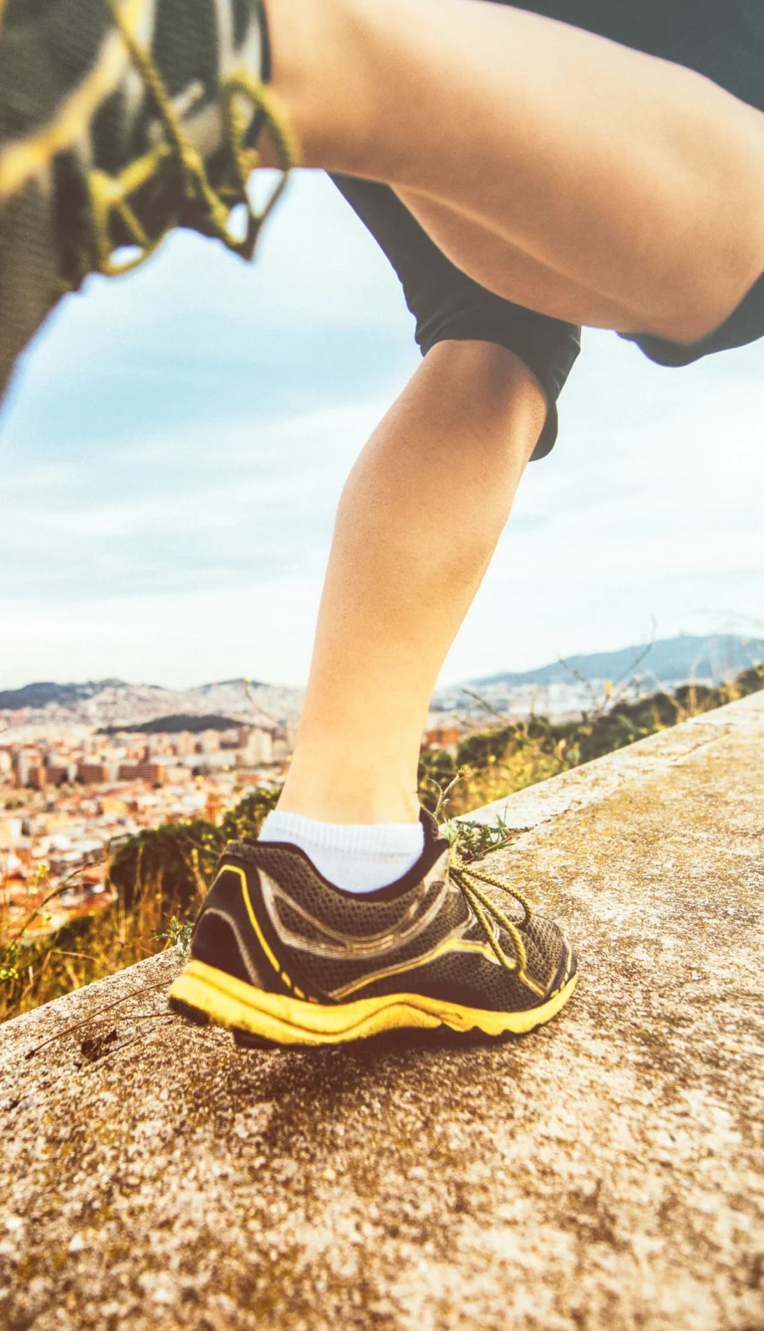 Running shoes on a rocky path